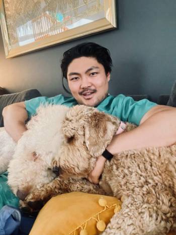 Dr. Yoo with 2 dogs